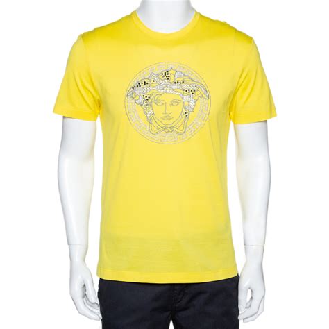 yellow versace shirt.